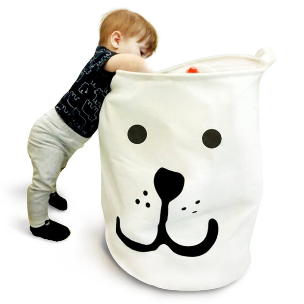Boy Finding Toy in Smiley Laundry Basket