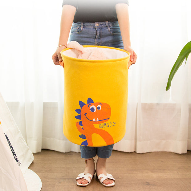 Holding a Yellow Little Dino Laundry Basket with Top Netting